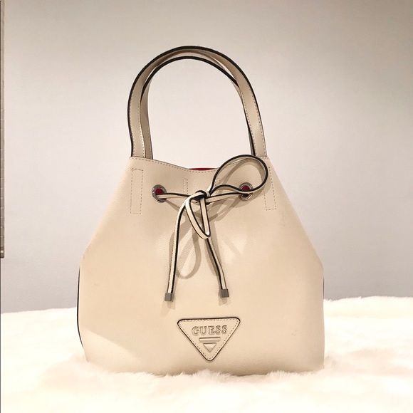 Guess Handbags - Guess purse with shoulder strap. Guess Handbags - Guess purse with shoulder strap.